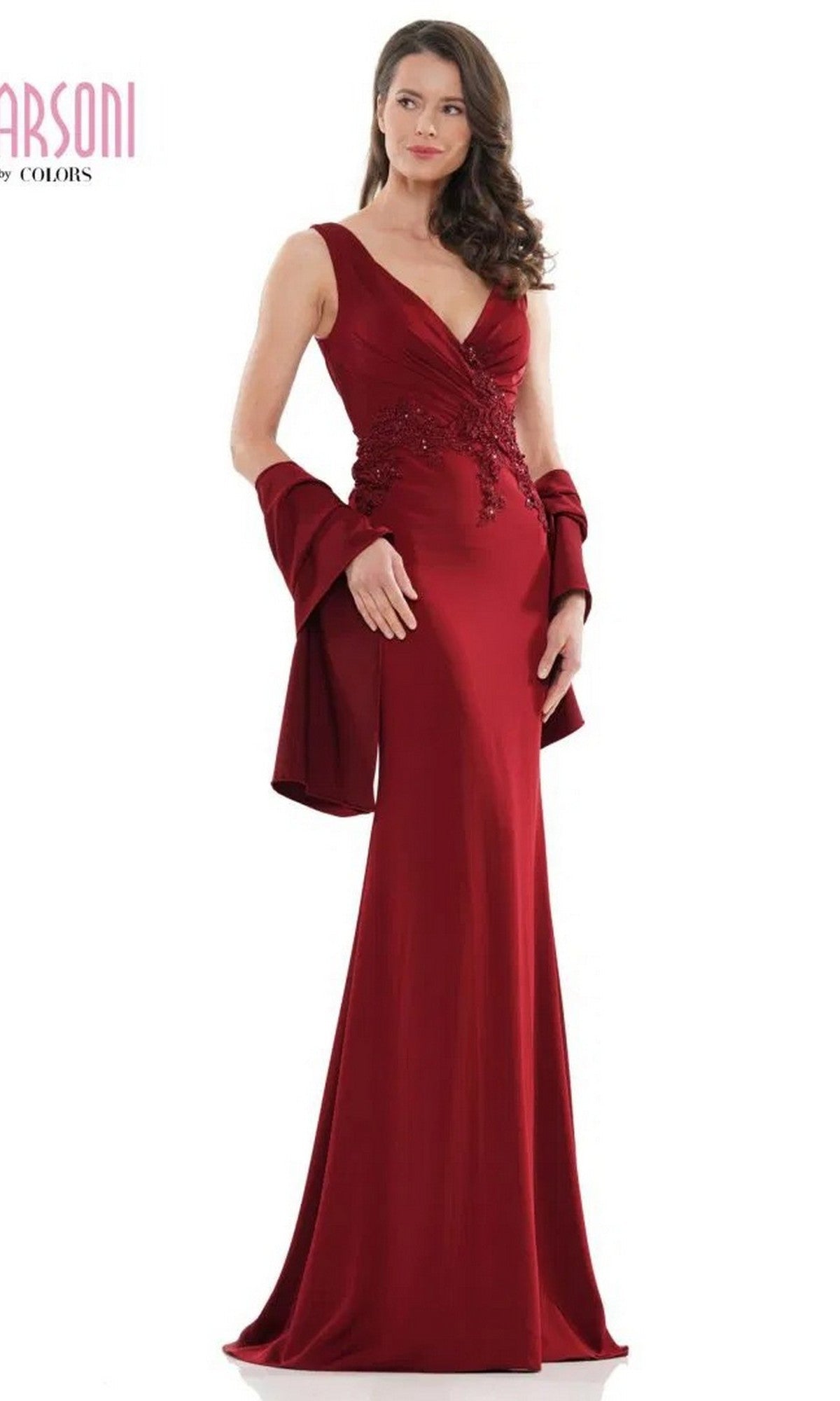 A woman models the Marsoni MV1054 long formal dress in wine, featuring a sleeveless design, embroidered bodice, matching shawl, and floor-length skirt against a plain white background.